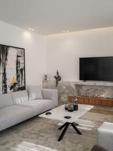 TV a/nebo společenská místnost v ubytování The Hidden GEM !