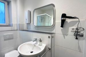 Ένα μπάνιο στο City Apartment in Krefeld