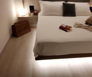 Postel nebo postele na pokoji v ubytování Panorama Hotel Friuli - Boutique Hotel