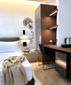 Postel nebo postele na pokoji v ubytování Panorama Hotel Friuli - Boutique Hotel