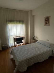 Posteľ alebo postele v izbe v ubytovaní Casa Diocesana VIA LUCIS