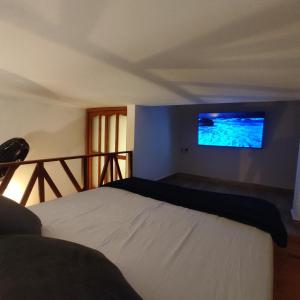 Postel nebo postele na pokoji v ubytování Hospedaje Oasis Blue Laureles Medellín