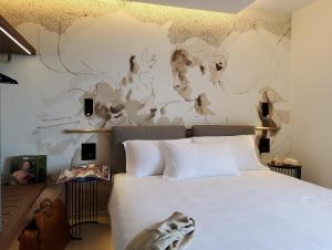 Postel nebo postele na pokoji v ubytování Panorama Hotel Friuli - Boutique Hotel