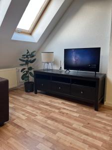 TV a/nebo společenská místnost v ubytování Apartmán Gabi