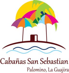 twee paraplu's op een eiland in het water bij Cabañas San Sebastian Palomino Beach Hostel in Palomino