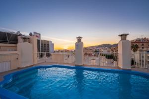 a swimming pool on the balcony of a apartment at Apartamentos Solset Nerja in Nerja