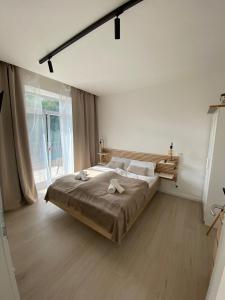 Postel nebo postele na pokoji v ubytování Apartmán u starého pivovaru + 14 fotografií