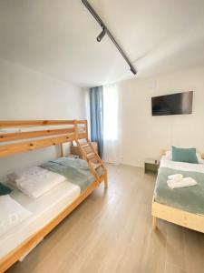 Postel nebo postele na pokoji v ubytování Apartmán u starého pivovaru