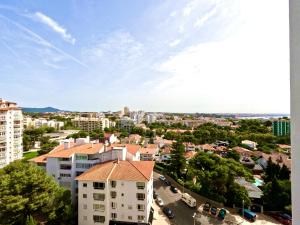 a view of a city from a building at Peaceful & panoramic views apartment, Cascais in Cascais