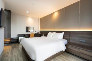 Postel nebo postele na pokoji v ubytování CÁT ANH HOTEL + 17 fotografií