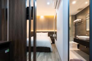 Postel nebo postele na pokoji v ubytování CÁT ANH HOTEL