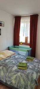 Postel nebo postele na pokoji v ubytování Lovely fully-equipped studio in Tisá village. Rocks only 5 minutes walk