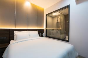 Postel nebo postele na pokoji v ubytování CÁT ANH HOTEL