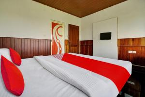 Łóżko lub łóżka w pokoju w obiekcie OYO Flagship 81283 Plaza Residency