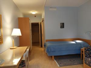 Postel nebo postele na pokoji v ubytování Birgittagården - GÄSTHEM - Birgittasystrarna