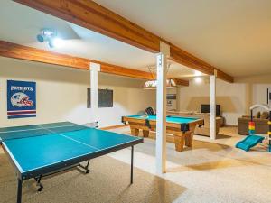 a living room with a ping pong table in it at Amazing mountain setting in Incline Village
