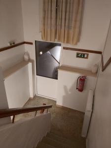 TV a/nebo společenská místnost v ubytování Ermis Hotel