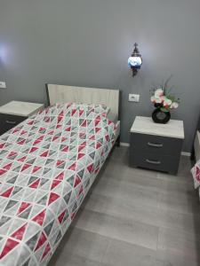 Ένα ή περισσότερα κρεβάτια σε δωμάτιο στο Apartman Stari most - Old Bridge
