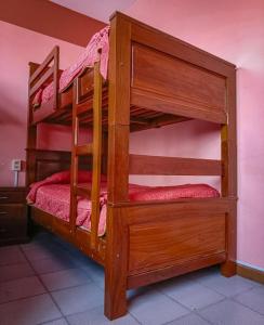 two bunk beds in a room with at Hostal Terrabella SRL in La Paz