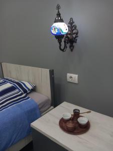 Ένα ή περισσότερα κρεβάτια σε δωμάτιο στο Apartman Stari most - Old Bridge