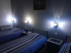 Ένα ή περισσότερα κρεβάτια σε δωμάτιο στο Apartman Stari most - Old Bridge