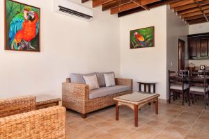 a living room with a couch and a table at X'tan Ha- The Waterfront in San Pedro