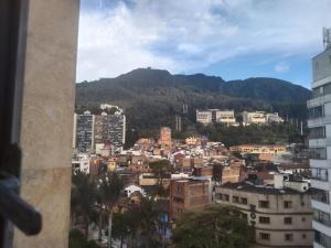 a view of a city from a building at Habitaciones Centro Histórico, ed, continental in Bogotá