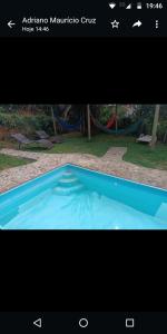ein Bildschirmfoto eines Schwimmbeckens in der Unterkunft Pousada Quiosque do Professor in Macacos