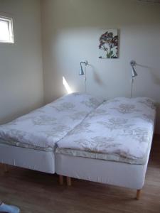 Postel nebo postele na pokoji v ubytování Borrby B&B