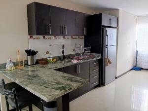 Fotografie z fotogalerie ubytování Departamento Grande con Jacuzzi v destinaci Cuenca