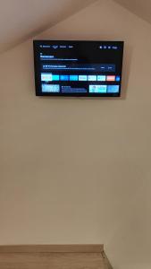 En tv och/eller ett underhållningssystem på Studio Uno cosy