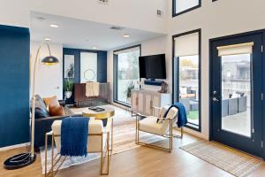 TV a/nebo společenská místnost v ubytování Illume 407