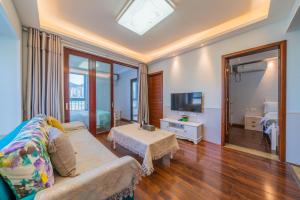 Μια τηλεόραση ή/και κέντρο ψυχαγωγίας στο Yue Ke Apartment - Changbin Road Branch