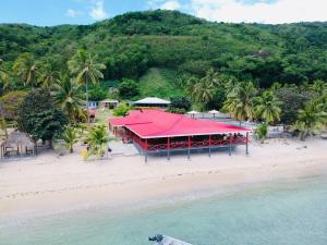 an aerial view of a resort on a beach at Korovou Eco Tour Resort in Naviti Island