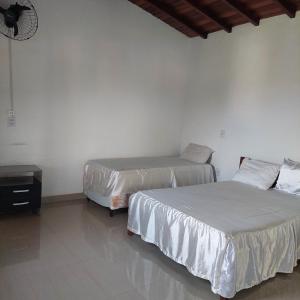 En eller flere senge i et værelse på Casa Ambrósio Capitólio + 22 billeder