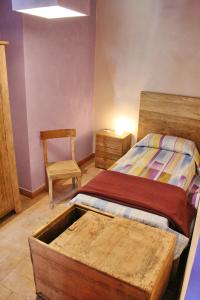 Un pat sau paturi într-o cameră la Country House La Torre