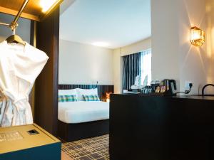 Postel nebo postele na pokoji v ubytování Starus Hotel Bukit Bintang