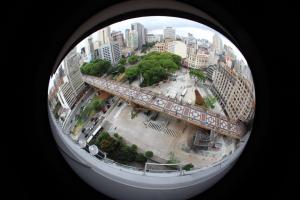 a circular view of a city from a building at Loft 37 Centro histórico in São Paulo