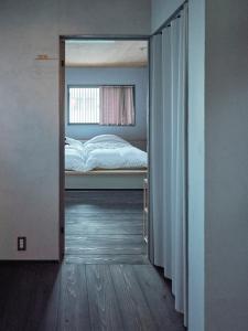 เตียงในห้องที่ 小鳩屋