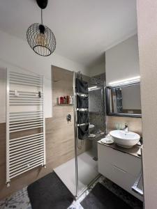 a bathroom with a shower and a sink at Il Castello di Alberico in Cotignola