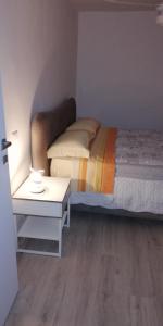 Ένα ή περισσότερα κρεβάτια σε δωμάτιο στο Casa Marina