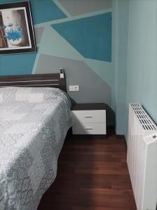 Cama o camas de una habitación en Habitación Villena lavanda