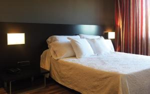 Katil atau katil-katil dalam bilik di Hotel Bruc