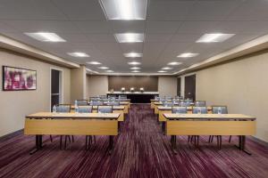 a conference room with rows of tables and chairs at Courtyard By Marriott Salinas Monterey in Salinas