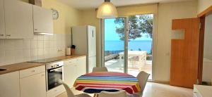 Kuchyň nebo kuchyňský kout v ubytování Oliver House + 22 fotografií