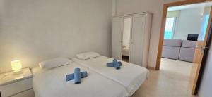 Postel nebo postele na pokoji v ubytování Oliver House