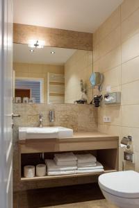Koupelna v ubytování Hotel Ettrich & Elbresort Rathen