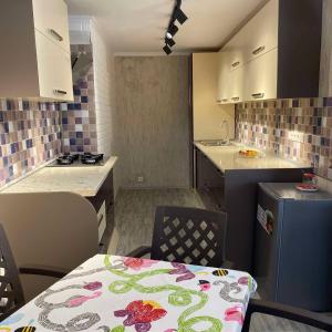 A kitchen or kitchenette at Maganiskhedi