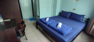 Postel nebo postele na pokoji v ubytování NAT 2 Guest House