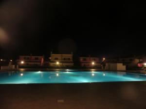 Бассейн в Residence Villaggio dei Fiori con Piscina e Posto Spiaggia Incluso или поблизости